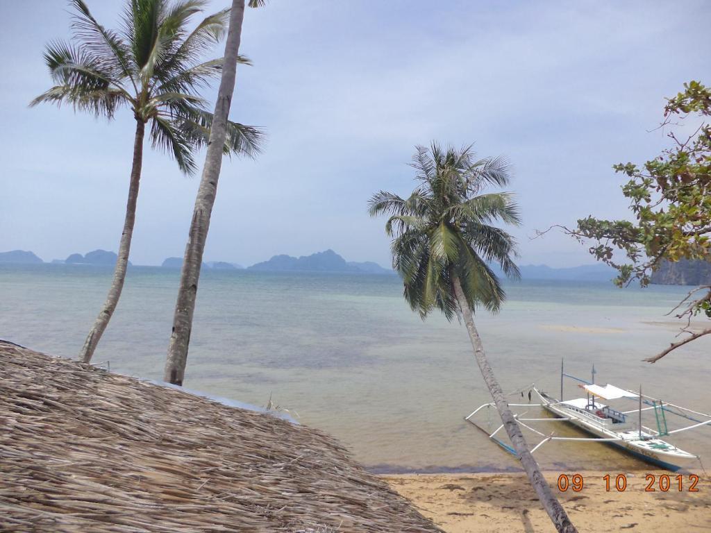 Islandfront Cottages And Restaurant Эль-Нидо Экстерьер фото